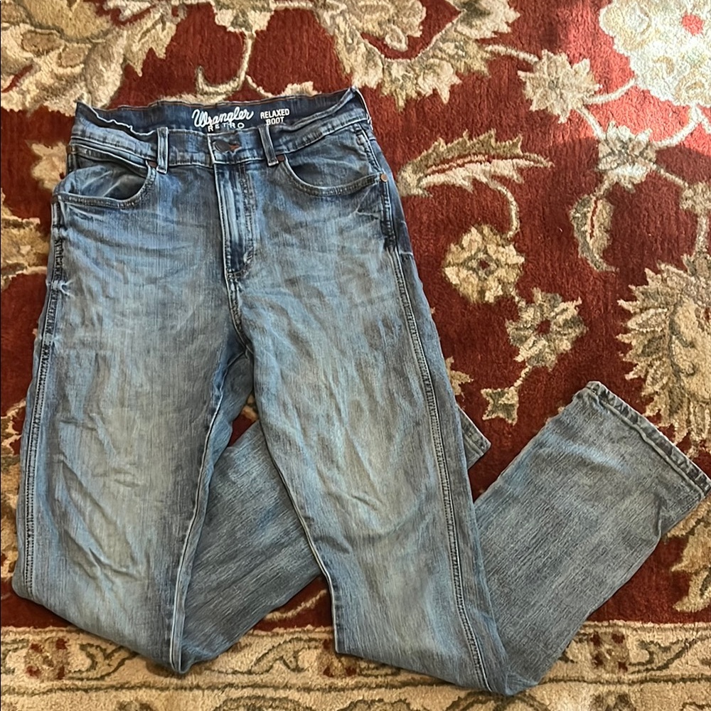 Wrangler Blue Relaxed Fit Jeans with Vintage Distressing